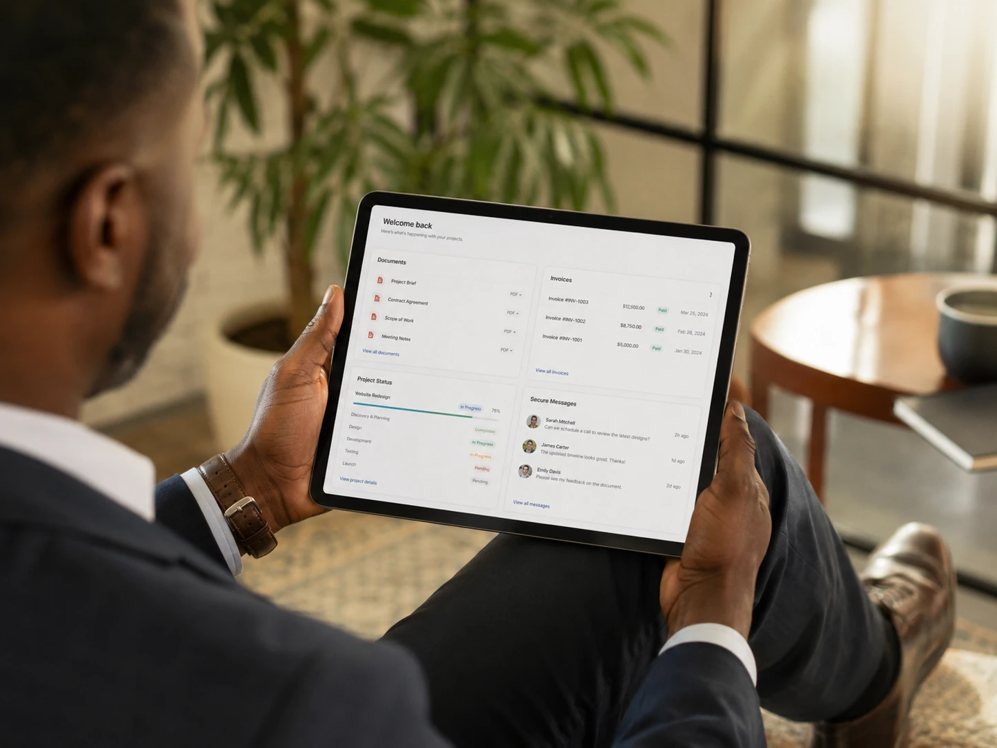 Client using a secure partner portal on a laptop